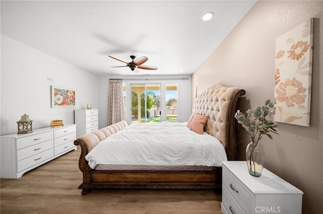 bedroom featuring recessed lighting, access to exterior, a ceiling fan, and light wood finished floors