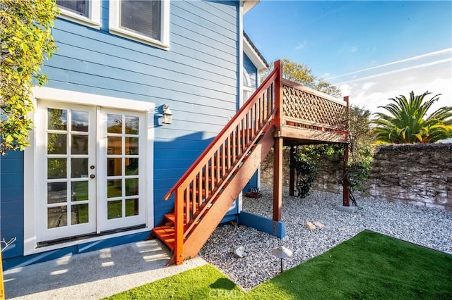 exterior space with french doors and a deck