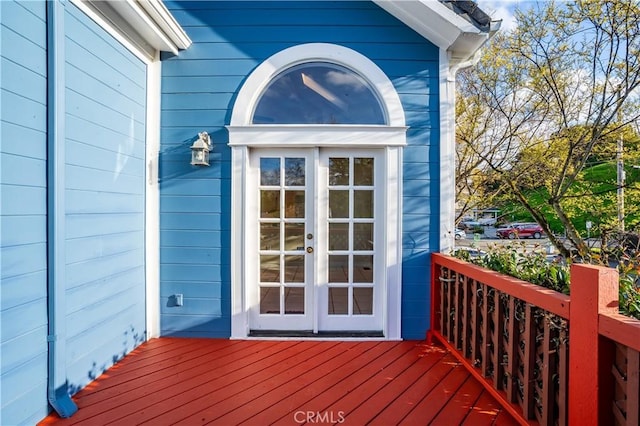 wooden terrace featuring french doors