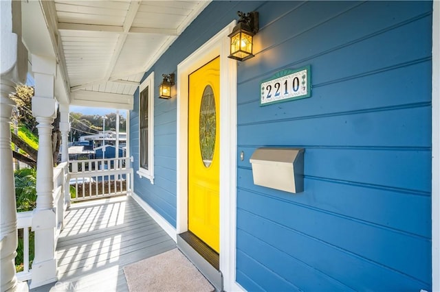 property entrance with a porch