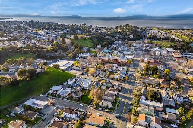 aerial view with a residential view and a water view