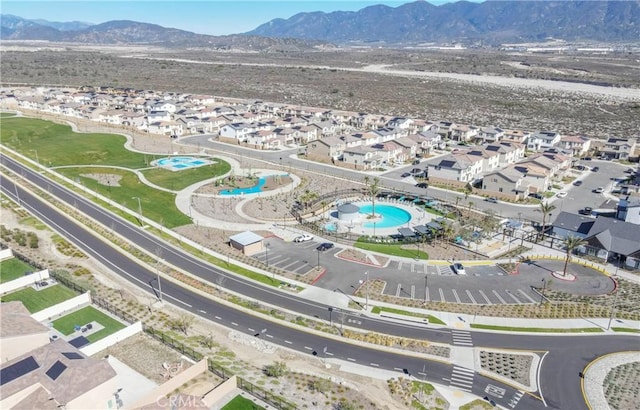 drone / aerial view with a residential view and a mountain view