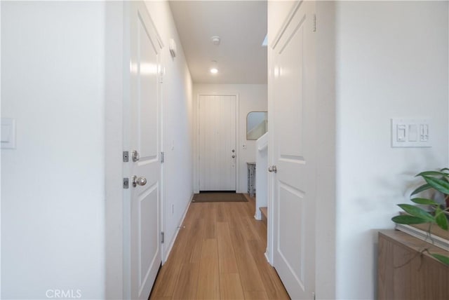 hall featuring light wood-style floors