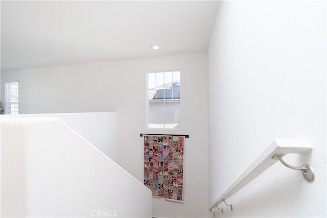 corridor with recessed lighting