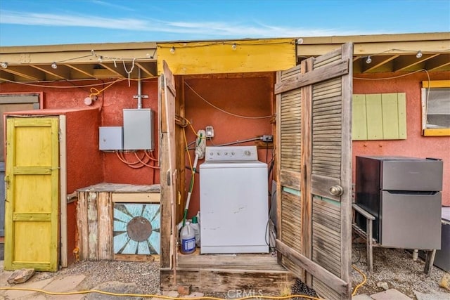 exterior space with washer / dryer