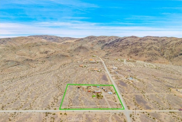 bird's eye view featuring view of desert and a mountain view