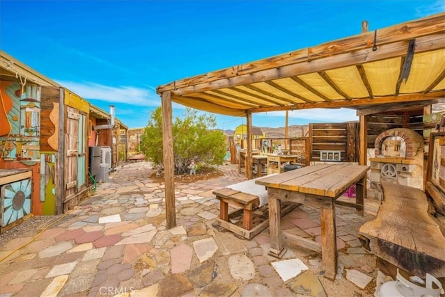 view of patio featuring an exterior structure and an outdoor structure