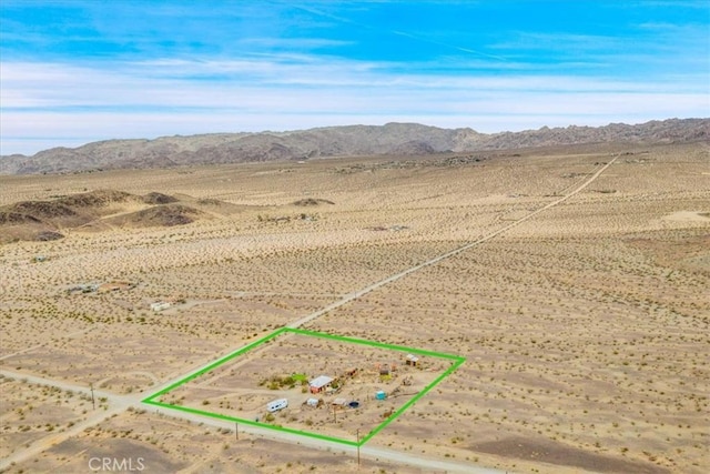 property view of mountains featuring a rural view and view of desert