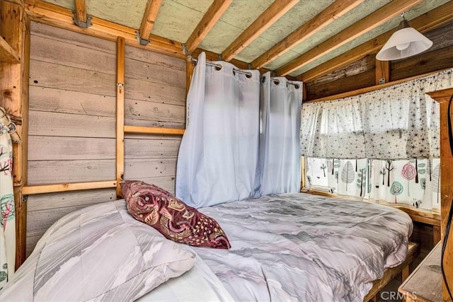 bedroom featuring lofted ceiling