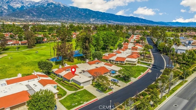 drone / aerial view featuring a mountain view and a residential view