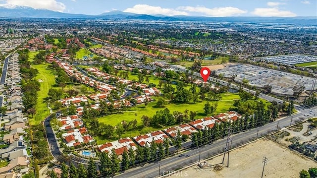 drone / aerial view featuring a mountain view