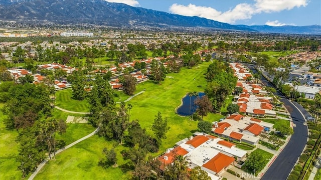 birds eye view of property with a mountain view and a residential view