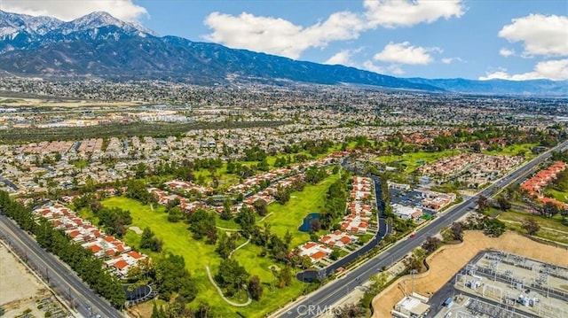 drone / aerial view featuring a mountain view