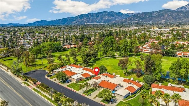 drone / aerial view featuring a mountain view and a residential view