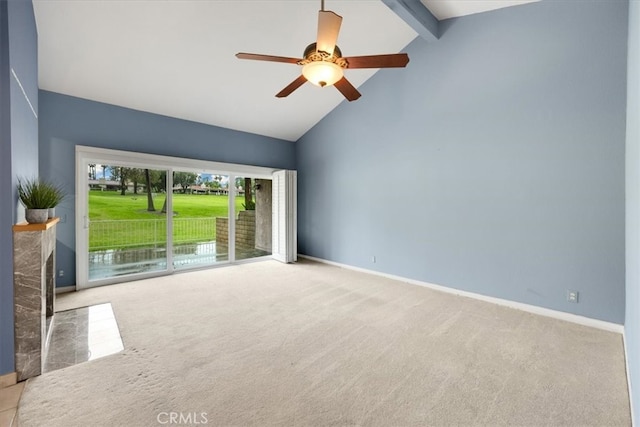 unfurnished room featuring baseboards, carpet floors, high vaulted ceiling, beam ceiling, and ceiling fan