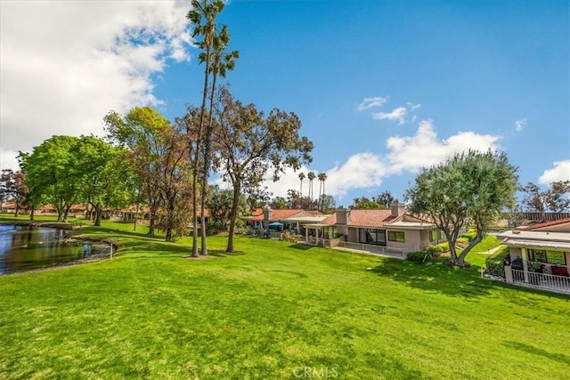 view of yard with a water view