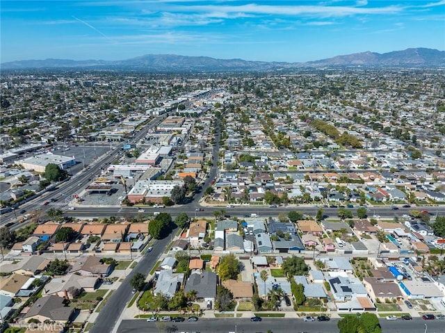 drone / aerial view with a residential view and a mountain view