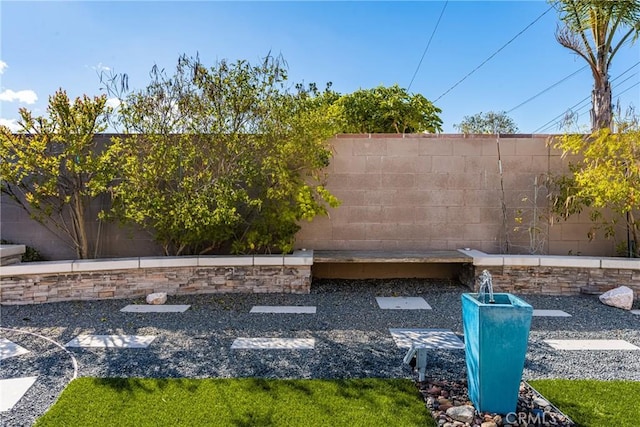 view of yard featuring a fenced backyard