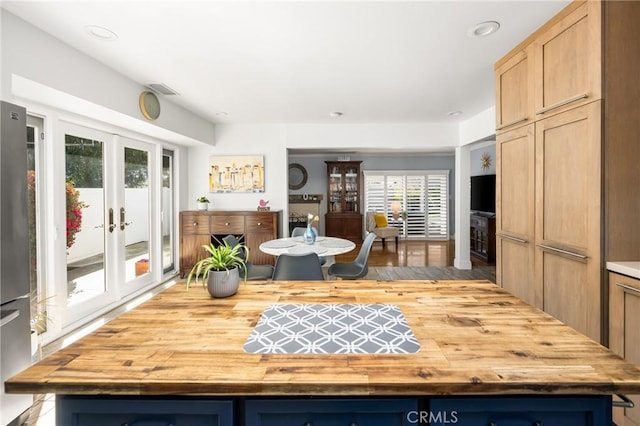 dining area featuring recessed lighting, french doors, and visible vents