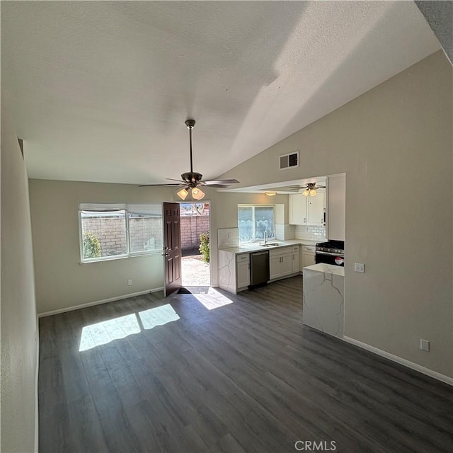 kitchen with visible vents, dishwasher, light countertops, and ceiling fan