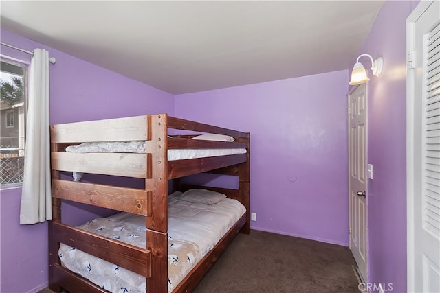 bedroom featuring carpet flooring