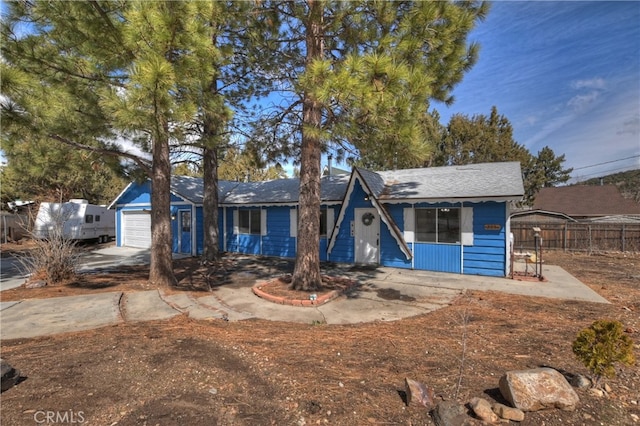 view of front of home with fence