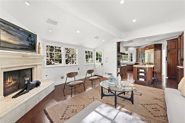 living room featuring baseboards, visible vents, lofted ceiling with beams, recessed lighting, and dark wood-style flooring