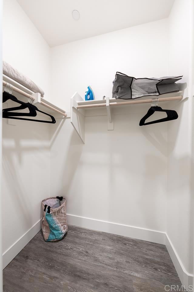 spacious closet with wood finished floors