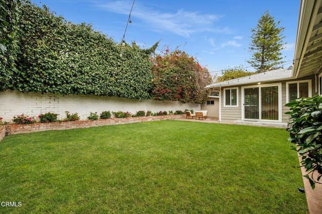 view of yard with a patio area and fence