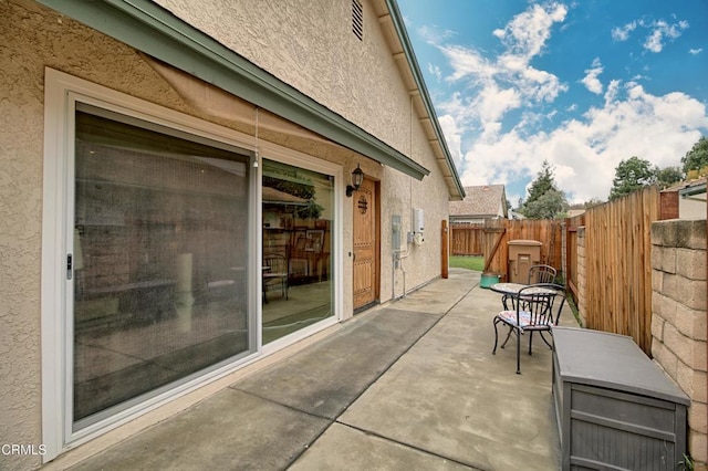 view of patio / terrace with fence