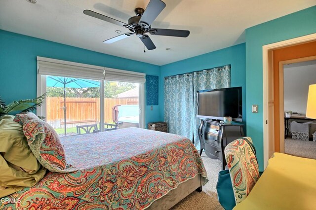 bedroom featuring access to outside, carpet flooring, and ceiling fan