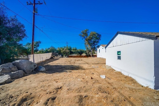 view of yard featuring fence