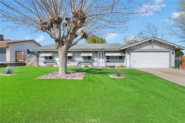 ranch-style house featuring a garage, concrete driveway, and a front yard