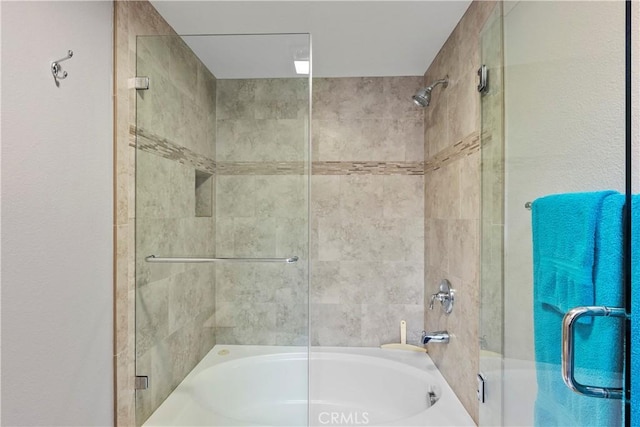 full bath featuring enclosed tub / shower combo