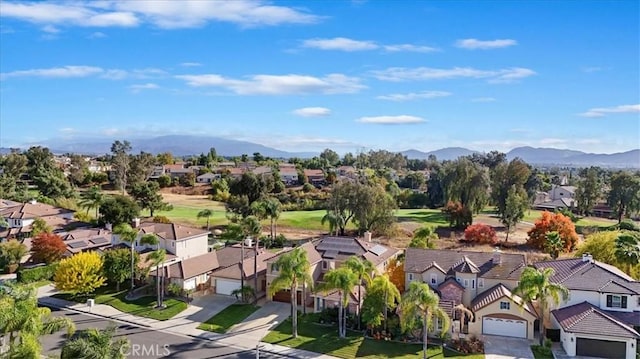 aerial view featuring a mountain view and a residential view