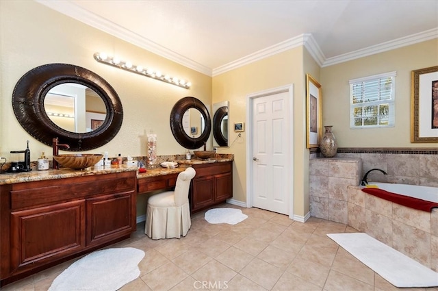 bathroom featuring a garden tub, a sink, crown molding, tile patterned flooring, and double vanity