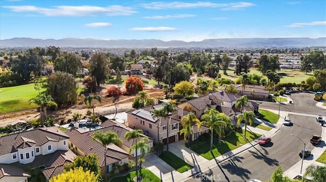 drone / aerial view with a residential view and a mountain view