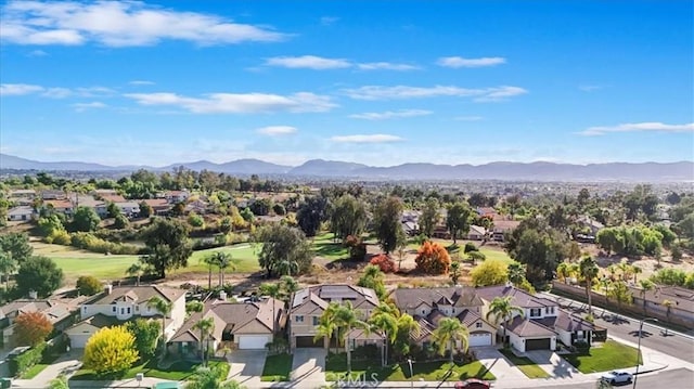 drone / aerial view featuring a mountain view and a residential view