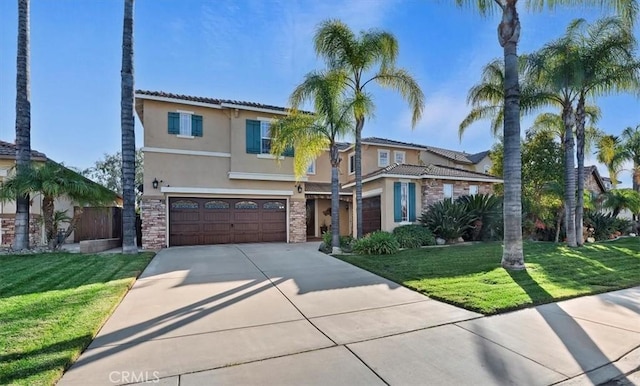 view of front of property with a front yard, an attached garage, stucco siding, concrete driveway, and stone siding