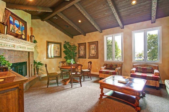 carpeted living room with baseboards, beam ceiling, recessed lighting, a tiled fireplace, and wooden ceiling