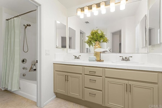 bathroom featuring shower / bath combination with curtain, double vanity, visible vents, and a sink