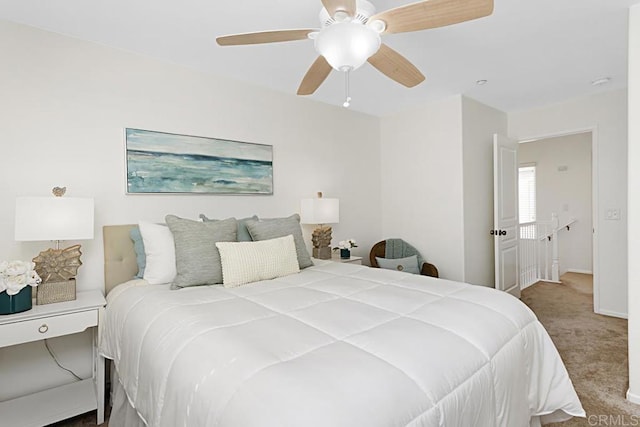 bedroom featuring ceiling fan and carpet floors