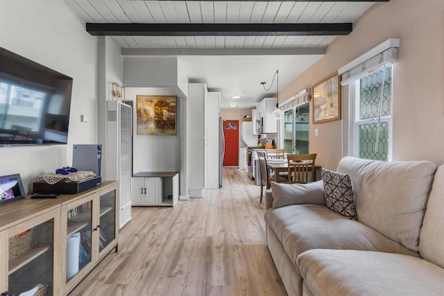 living room with beamed ceiling, light wood-style floors, and wooden ceiling