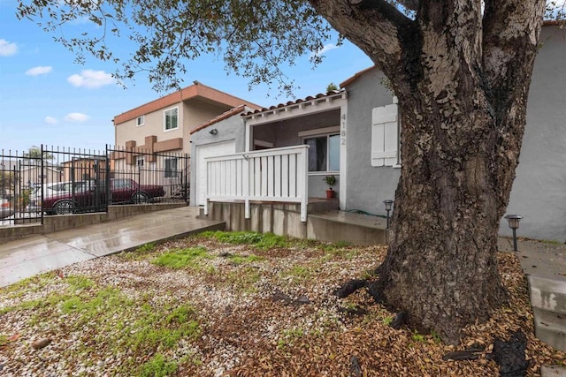 exterior space featuring fence