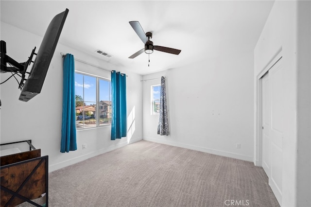 bedroom with visible vents, baseboards, and carpet floors