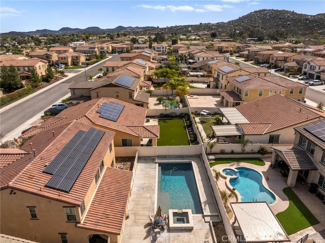 bird's eye view with a residential view and a mountain view