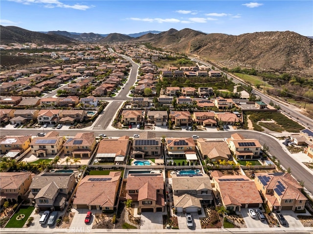 aerial view featuring a mountain view and a residential view