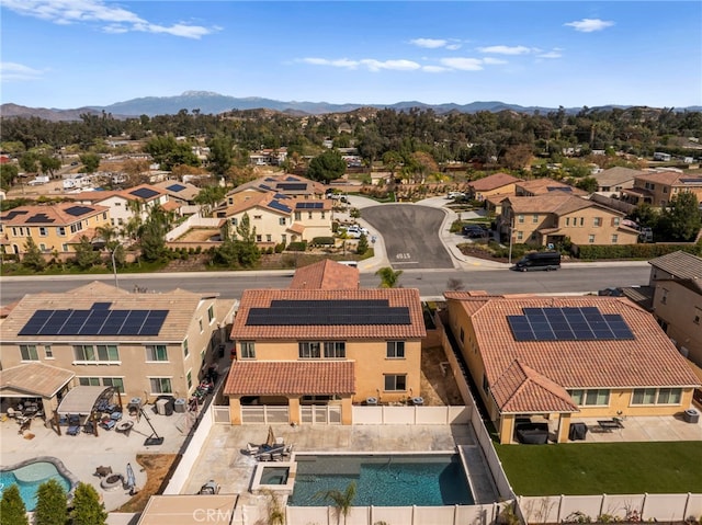 aerial view featuring a mountain view and a residential view