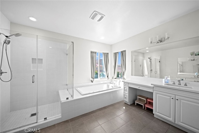 bathroom with a bath, visible vents, a shower stall, and vanity