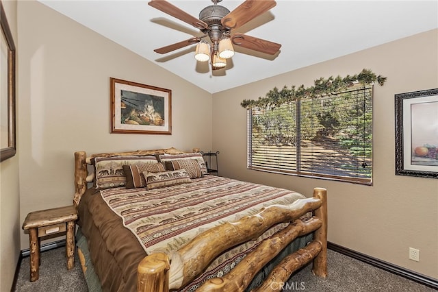 bedroom with carpet flooring, baseboards, lofted ceiling, and a ceiling fan